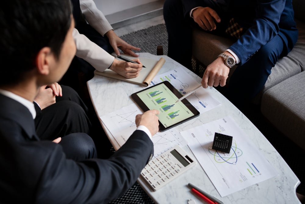 A credit committee examines detailed financial and operational reports to assess unsecured debt eligibility, ensuring clarity and fairness in lending decisions.